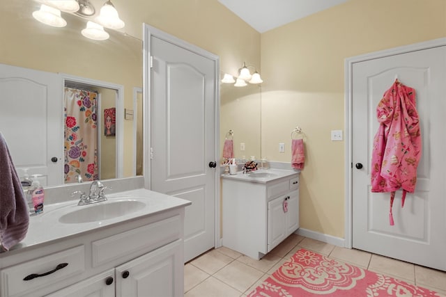 18551 Lazy Ln, Flint, TX 75762 - full bathroom featuring tile patterned floors, two vanities, and a shower with shower curtain