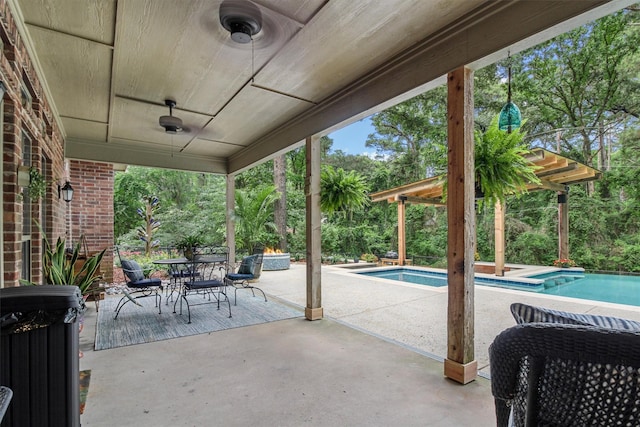 18551 Lazy Ln, Flint, TX 75762 - view of patio featuring an outdoor pool and outdoor dining area