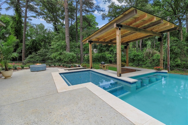 18551 Lazy Ln, Flint, TX 75762 - outdoor pool featuring a patio area and view of wooded area