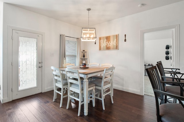 3617 Fordham St, Frisco, TX 75036 - dining space featuring dark wood finished floors, a chandelier, and baseboards