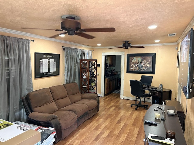 1611 Ave B, Dallas, TX 75203 - home office with ceiling fan, light wood-style flooring, a textured ceiling, and crown molding