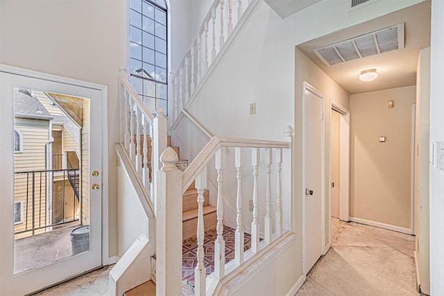 4430 Point Blvd Unit 204, Garland, TX 75043 - stairway featuring baseboards