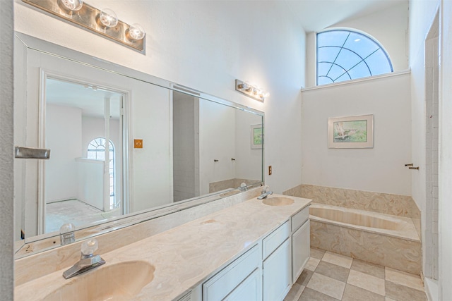 4430 Point Blvd Unit 204, Garland, TX 75043 - bathroom with double vanity and a bath