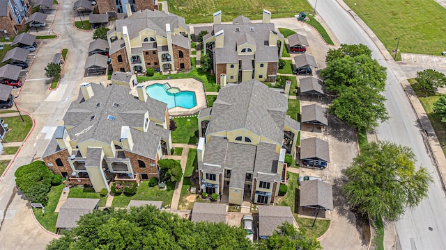 4430 Point Blvd Unit 204, Garland, TX 75043 - aerial view of property and surrounding area featuring nearby suburban area and a pool area