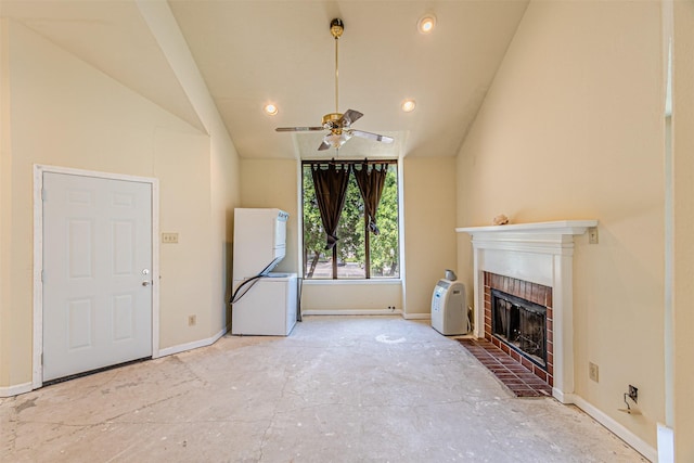 4430 Point Blvd Unit 204, Garland, TX 75043 - unfurnished living room featuring a fireplace, baseboards, lofted ceiling, ceiling fan, and recessed lighting
