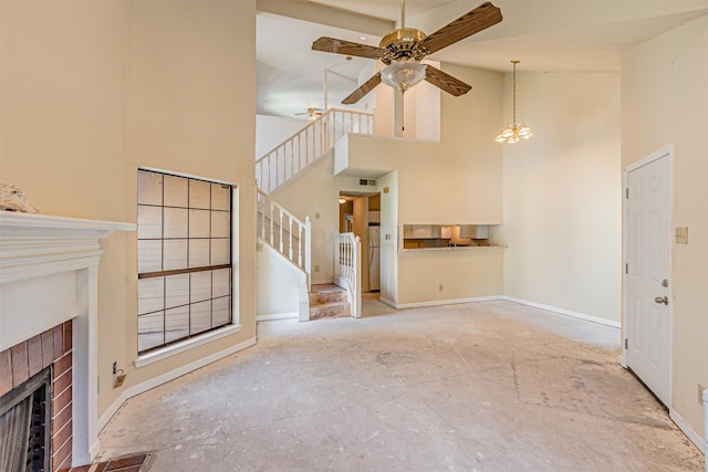 4430 Point Blvd Unit 204, Garland, TX 75043 - unfurnished living room featuring a brick fireplace, ceiling fan, baseboards, a high ceiling, and stairway