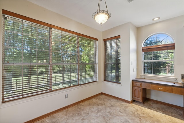 2822 Roundrock, Mckinney, TX 75072 - unfurnished office featuring built in study area and baseboards