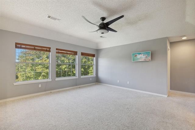 2822 Roundrock, Mckinney, TX 75072 - unfurnished room with ceiling fan, a textured ceiling, carpet floors, and baseboards