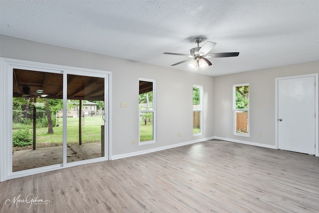 4210 Via St, Shreveport, LA 71109 - empty room with a ceiling fan, wood finished floors, baseboards, and a textured ceiling