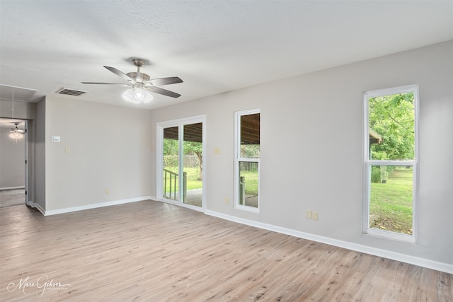 4210 Via St, Shreveport, LA 71109 - empty room featuring attic access, baseboards, and plenty of natural light