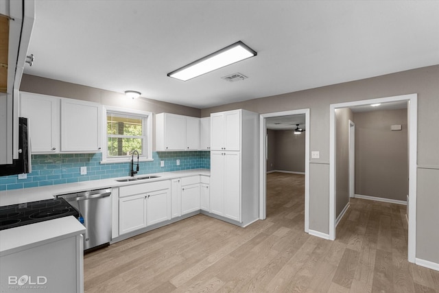 9312 Pine Grove St, Shreveport, LA 71118 - kitchen with a sink, stainless steel dishwasher, tasteful backsplash, light wood-type flooring, and light countertops