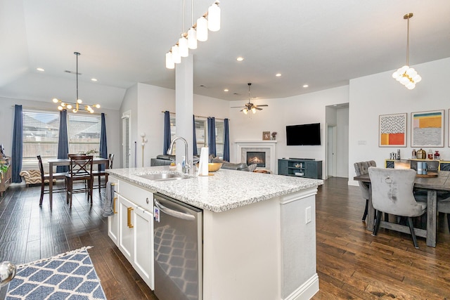 1502 Barley Ct, Forney, TX 75126 - kitchen featuring a sink, dishwasher, recessed lighting, a warm lit fireplace, and dark wood-style flooring
