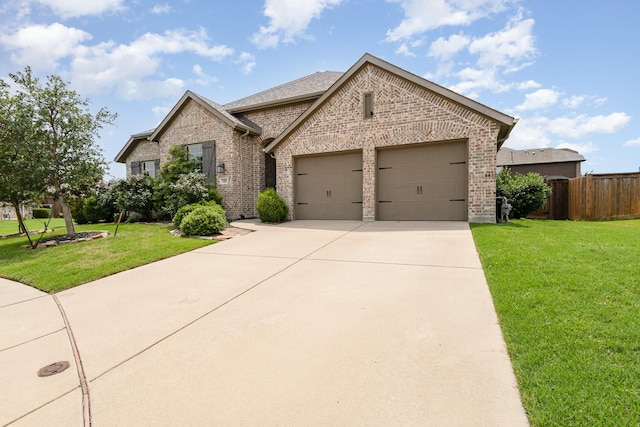1502 Barley Ct, Forney, TX 75126 - french provincial home featuring brick siding, a garage, and driveway