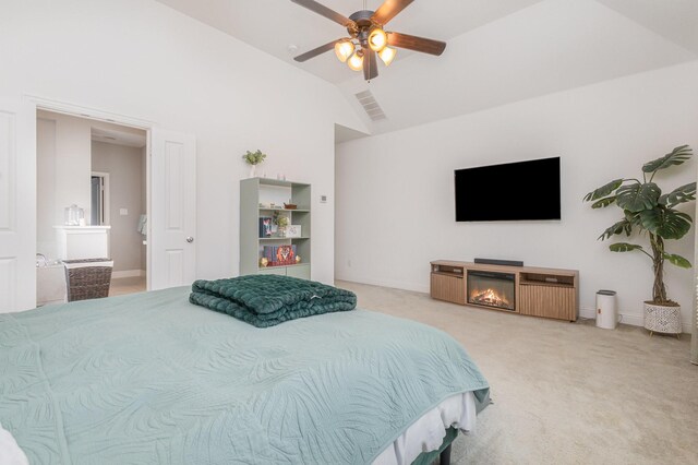 1502 Barley Ct, Forney, TX 75126 - carpeted bedroom featuring baseboards, a lit fireplace, a ceiling fan, and high vaulted ceiling