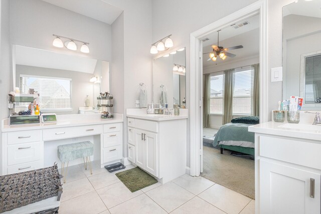 1502 Barley Ct, Forney, TX 75126 - bathroom with tile patterned flooring, a ceiling fan, healthy amount of natural light, lofted ceiling, and ensuite bathroom