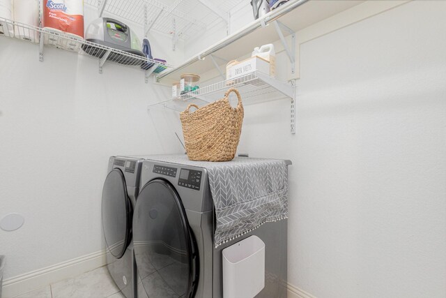 1502 Barley Ct, Forney, TX 75126 - washroom with independent washer and dryer, baseboards, and tile patterned flooring
