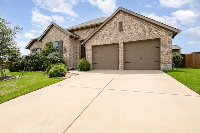 1502 Barley Ct, Forney, TX 75126 - french provincial home with brick siding, an attached garage, and concrete driveway