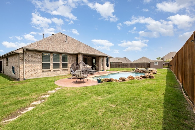 1502 Barley Ct, Forney, TX 75126 - rear view of property featuring brick siding, roof with shingles, a patio, and a pool with connected hot tub