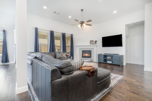 1502 Barley Ct, Forney, TX 75126 - living area with ceiling fan, dark wood-type flooring, baseboards, plenty of natural light, and recessed lighting