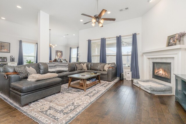 1502 Barley Ct, Forney, TX 75126 - living area with plenty of natural light, a tiled fireplace, ceiling fan, dark wood-style floors, and recessed lighting