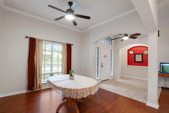 1212 Live Oak St, Royse City, TX 75189 - foyer with ceiling fan, arched walkways, ornamental molding, light wood-type flooring, and baseboards