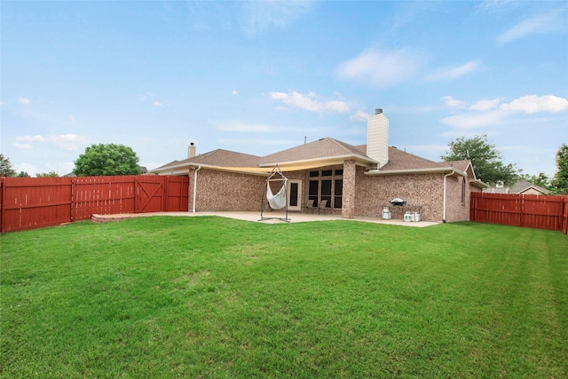 1212 Live Oak St, Royse City, TX 75189 - rear view of house featuring a patio area, brick siding, a chimney, and roof with shingles