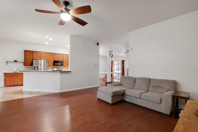 1212 Live Oak St, Royse City, TX 75189 - living room with ceiling fan, light wood-style flooring, recessed lighting, and baseboards