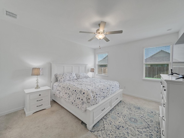 316 Crossvine Way, Princeton, TX 75407 - bedroom featuring multiple windows, light colored carpet, baseboards, and ceiling fan