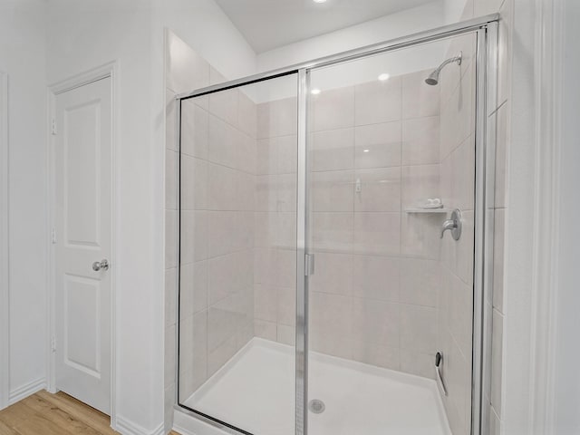 316 Crossvine Way, Princeton, TX 75407 - full bath featuring a shower stall and wood finished floors