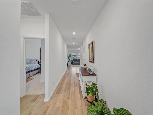 316 Crossvine Way, Princeton, TX 75407 - hallway with light wood-type flooring, recessed lighting, and baseboards