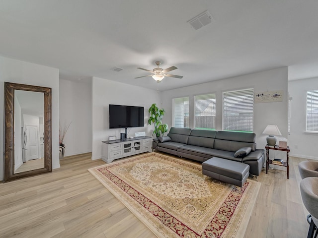 316 Crossvine Way, Princeton, TX 75407 - living room with a ceiling fan, light wood finished floors, and baseboards