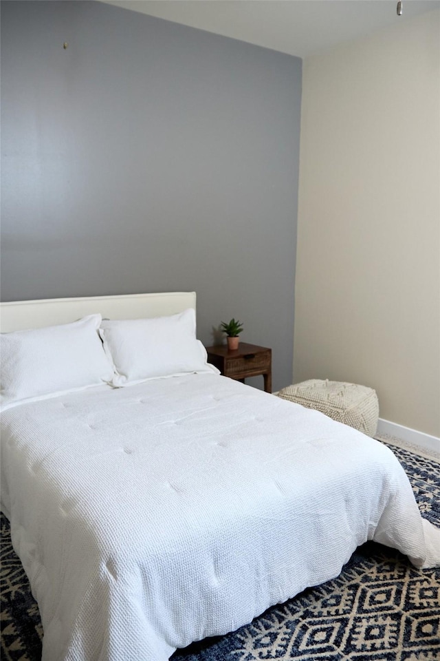 2600 W 7th St Unit 1713, Fort Worth, TX 76107 - bedroom featuring baseboards and carpet