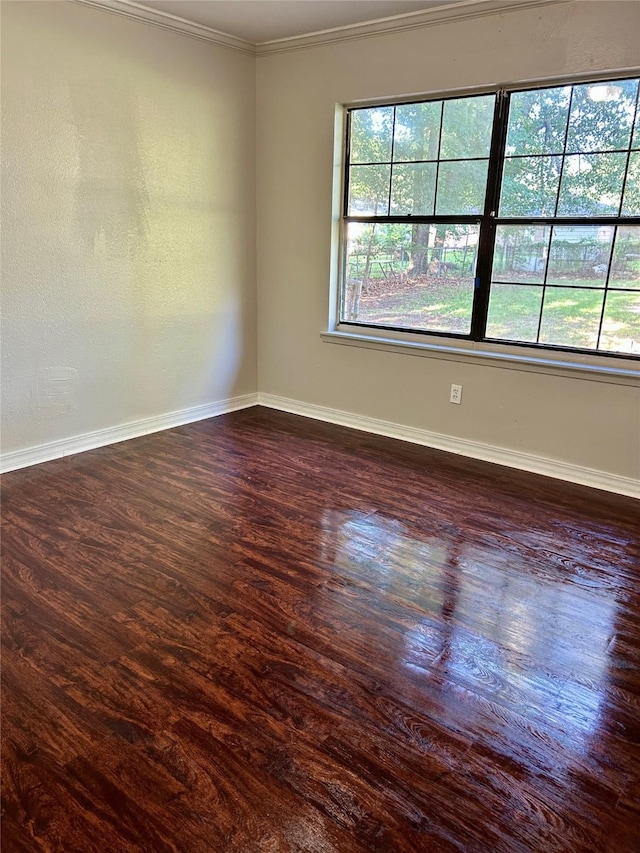 1202 Pin Oak Pl, Shreveport, LA 71107 - spare room featuring ornamental molding, dark wood-style flooring, and baseboards