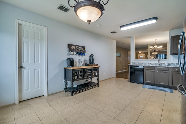 1224 Evergreen St, Royse City, TX 75189 - kitchen featuring dishwasher, a chandelier, decorative light fixtures, and light tile patterned floors