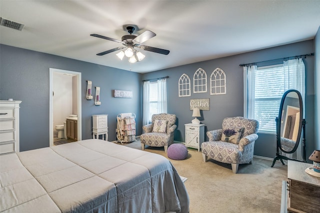 1224 Evergreen St, Royse City, TX 75189 - carpeted bedroom with ensuite bathroom and a ceiling fan