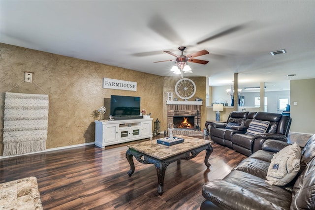 1224 Evergreen St, Royse City, TX 75189 - living area featuring a ceiling fan, dark wood-type flooring, baseboards, and a fireplace