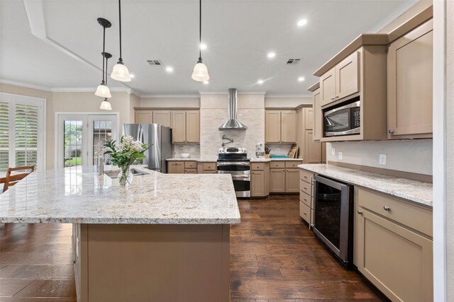 9205 Yellow Stone Rd, Waco, TX 76712 - kitchen with appliances with stainless steel finishes, beverage cooler, wall chimney exhaust hood, ornamental molding, and backsplash