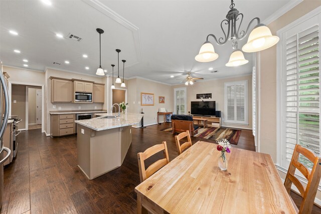 9205 Yellow Stone Rd, Waco, TX 76712 - dining room with dark wood-style floors, ornamental molding, ceiling fan, healthy amount of natural light, and baseboards