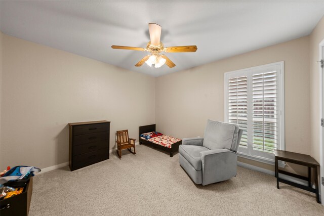 9205 Yellow Stone Rd, Waco, TX 76712 - carpeted bedroom with baseboards and ceiling fan