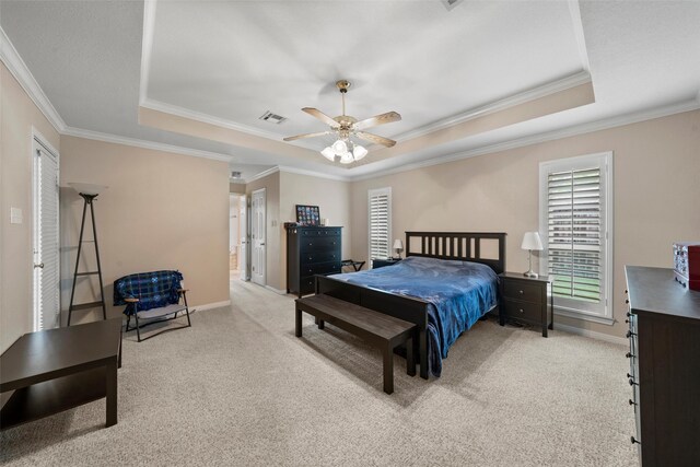 9205 Yellow Stone Rd, Waco, TX 76712 - bedroom with a raised ceiling, multiple windows, carpet floors, and crown molding