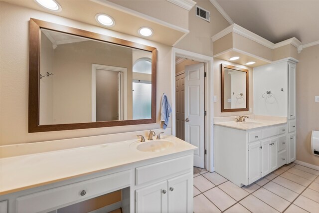 9205 Yellow Stone Rd, Waco, TX 76712 - bathroom with ornamental molding, vanity, and tile patterned floors