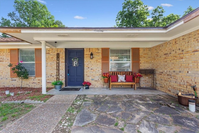 1004 Fairway Ln, Mexia, TX 76667 - property entrance featuring brick siding and covered porch