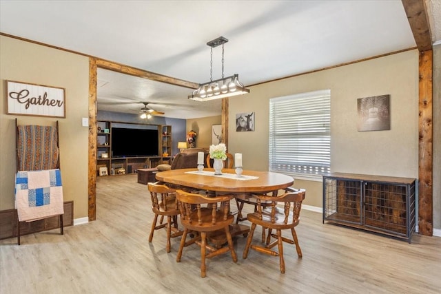 1004 Fairway Ln, Mexia, TX 76667 - dining area featuring baseboards, light wood-style flooring, ceiling fan, and crown molding