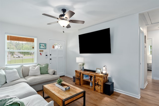 2147 Pine Hill Rd, Shreveport, LA 71107 - living room featuring light wood-style flooring, ceiling fan, attic access, and baseboards