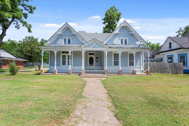 413 Houghton Ave, Marlin, TX 76661 - victorian-style house with covered porch