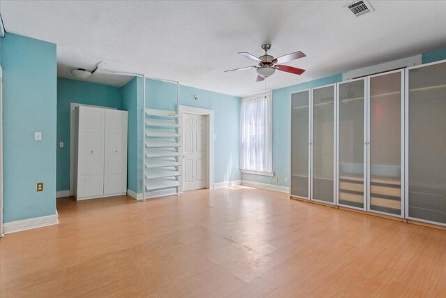 413 Houghton Ave, Marlin, TX 76661 - unfurnished room with ceiling fan, wood finished floors, and baseboards