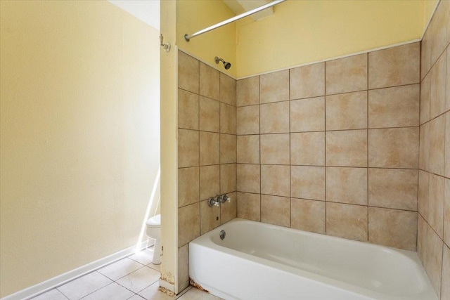 413 Houghton Ave, Marlin, TX 76661 - full bath with toilet, tile patterned flooring, baseboards, and washtub / shower combination