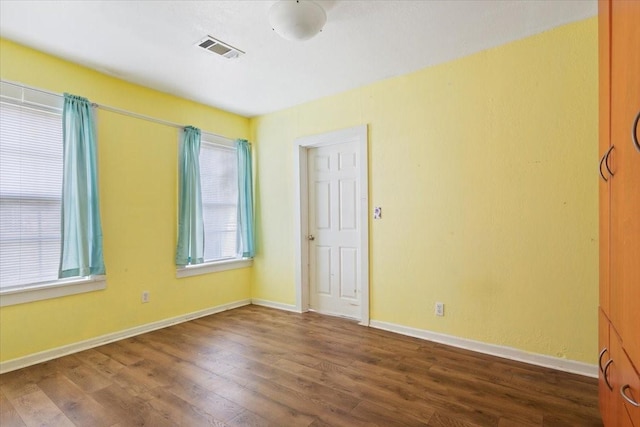 413 Houghton Ave, Marlin, TX 76661 - empty room featuring wood finished floors and baseboards