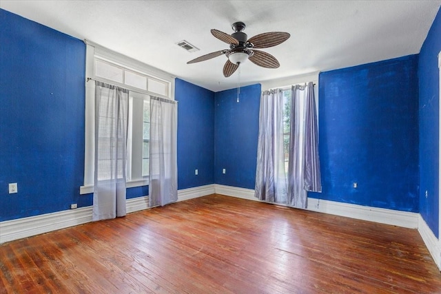 413 Houghton Ave, Marlin, TX 76661 - empty room featuring hardwood / wood-style flooring, a ceiling fan, and baseboards