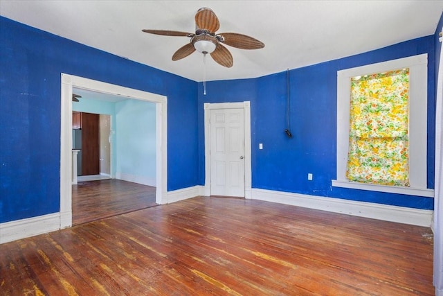413 Houghton Ave, Marlin, TX 76661 - empty room with ceiling fan, wood finished floors, and baseboards